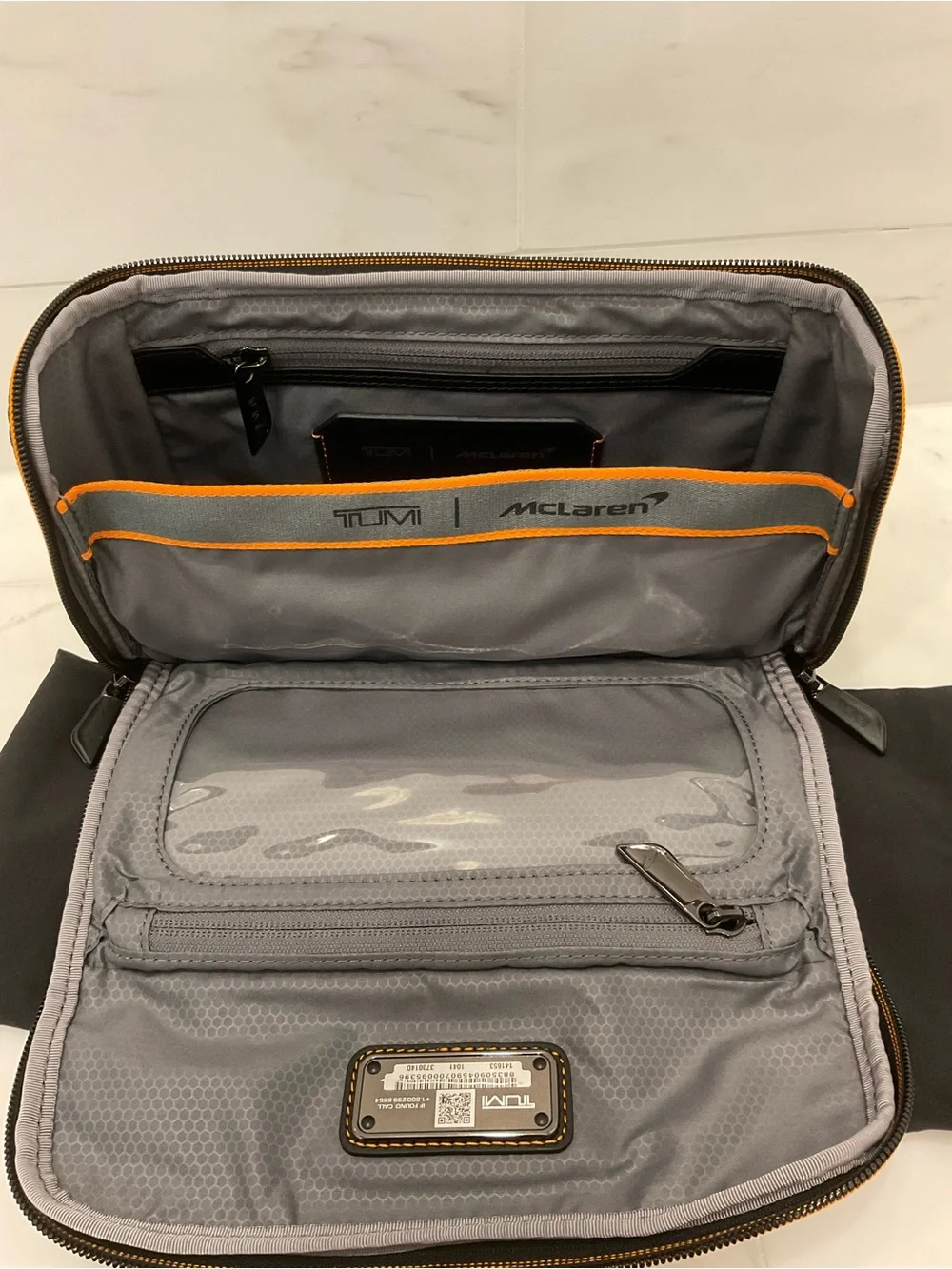 NWOT Tumi McLaren REMEX 10.0” x 5.25” Accessory Kit Bag - BLACK & PAPAYA ORANGE